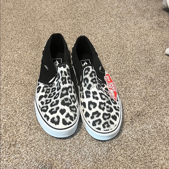 Vans Shoes - Vans Black and White Animal Print Slip-Ons